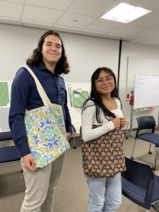 Two W&L students with their finished tote bags!